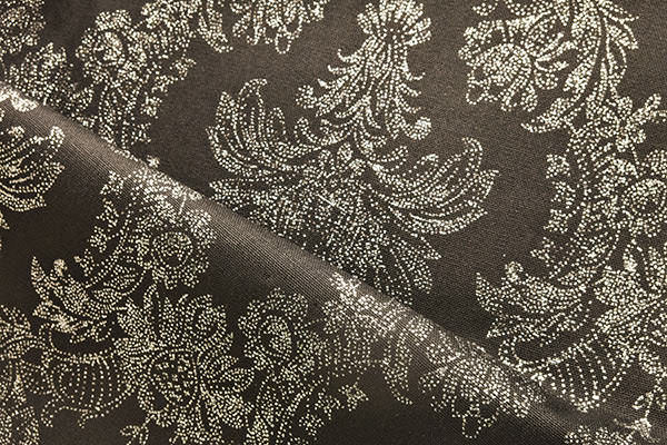 Tailor Made: Stampa glitter con disegno barocco su base canvas cotone
